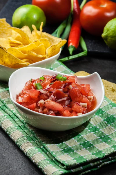 Bowl of fresh salsa with tortilla chips — Stock Photo, Image