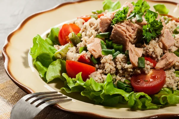 Tasty salad with couscous, tuna and vegetables — Stock Photo, Image