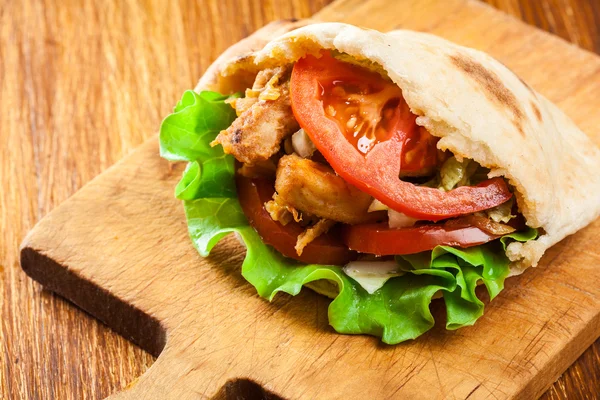 Doner kebab - fried chicken meat with vegetables — Stock Photo, Image