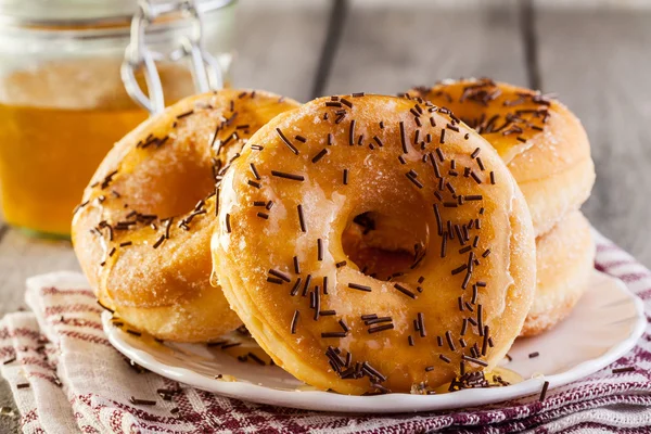 Desayuno con rosquillas y miel —  Fotos de Stock