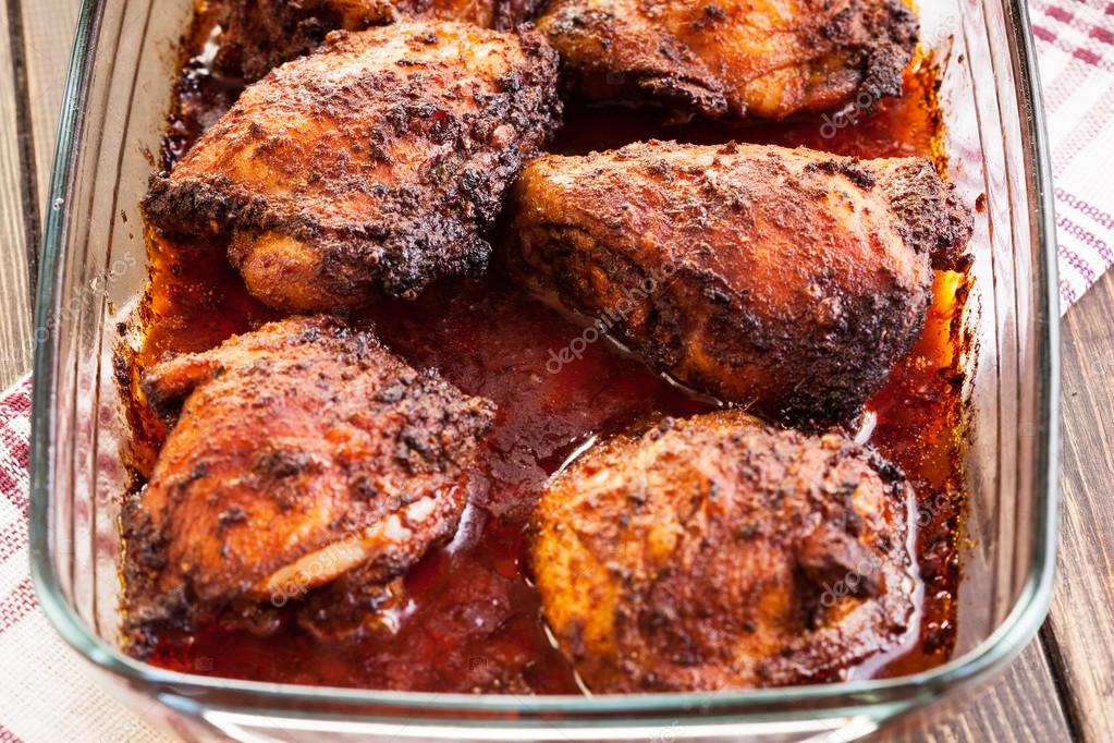 Roasted chicken drumsticks in casserole dish Stock Photo by ©fotek 53750861