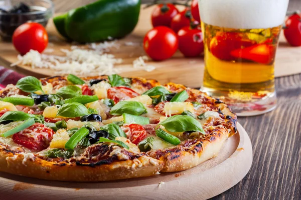 Pizza hawaii with beer — Stock Photo, Image