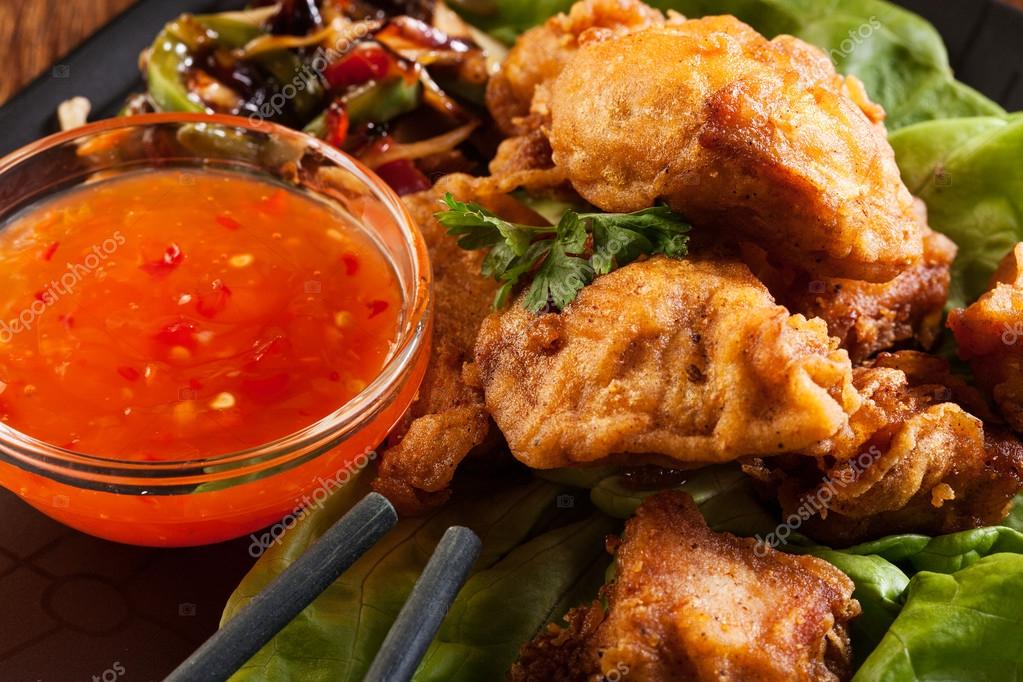 Fried chicken pieces in batter — Stock Photo © fotek 64959249