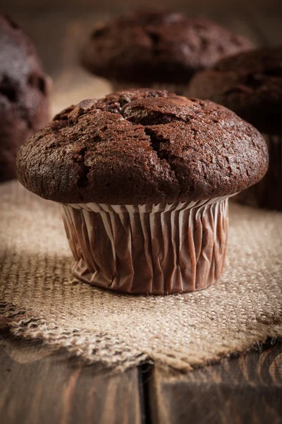 Chocolate cake muffins on a table — Stock Photo, Image