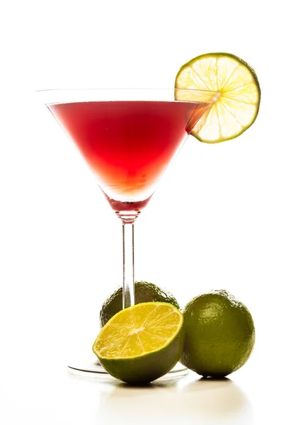 Cosmopolitan cocktail garnished with lime — Stock Photo, Image