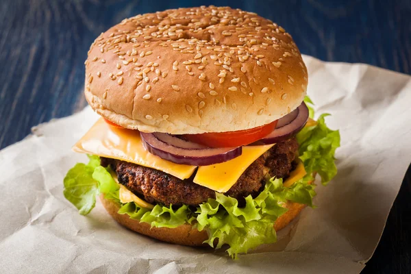 Hamburger on paper — Stock Photo, Image