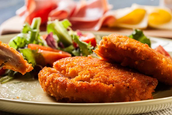 Cutlet Cordon Bleu with salad — Stock Photo, Image