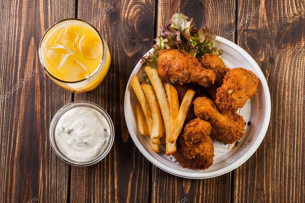 Crisp crunchy wings with chips Stock Photo by ©fotek 68710947