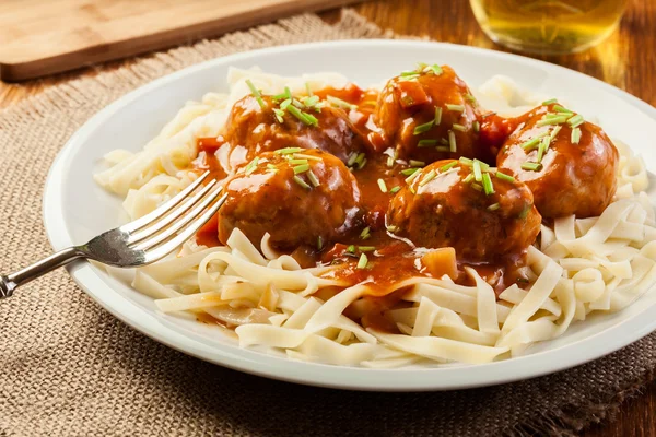 Pasta fettuccine and meatballs with tomato sauce — Stock Photo, Image