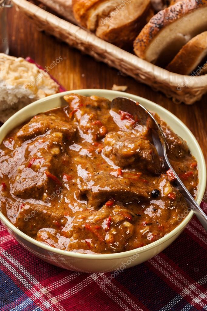 Beef stew served with crusty bread Stock Photo by ©fotek 84103122
