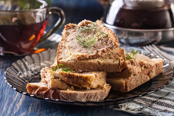 Slices of bread with baked pate on plate — Stock Photo, Image