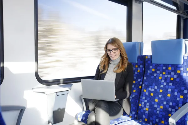 Businesswoman using laptop — Stock Photo, Image