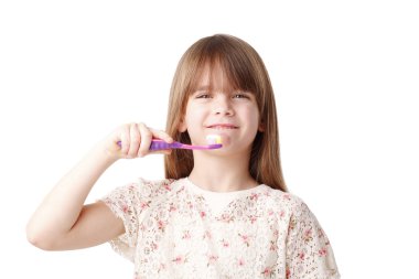 Bir diş fırçası tutan kız