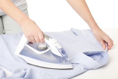 woman  ironing shirt. clipart