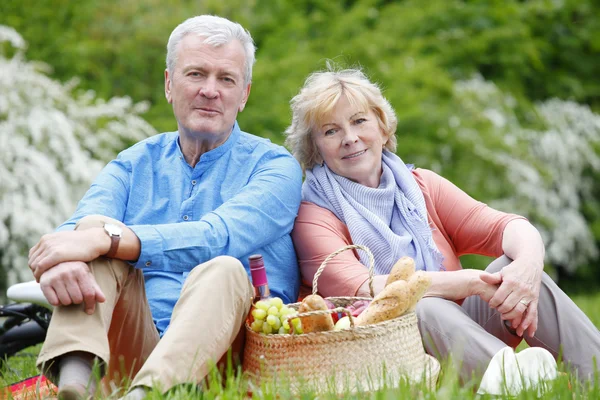 Senior couple sitting  and relaxing. — Stock Photo, Image