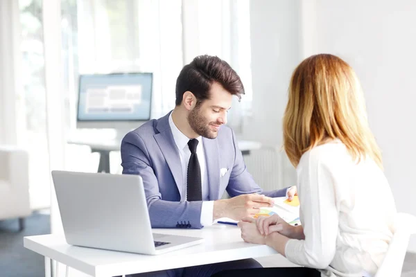 Business people sitting at meeting — Stock Photo, Image