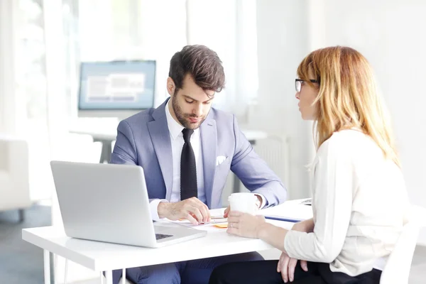 Business people sitting at meeting — Stock Photo, Image