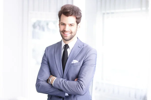 Businessman  standing in office — Stock Photo, Image