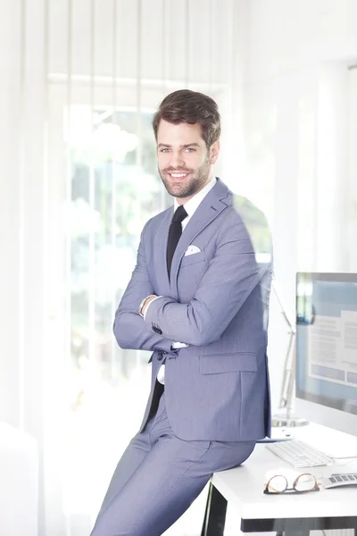 Businessman with arms crossed standing — Stock Photo, Image