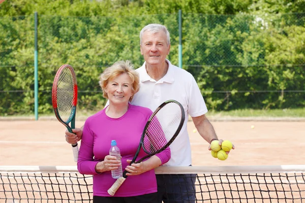 trainer and  woman standing