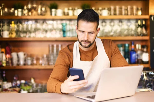 Portrait Smiling Waiter Text Messaging Using Laptop While Standing Counter — Stock Photo, Image