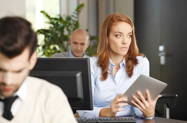 Businesswoman holding digital tablet — Stock Photo, Image