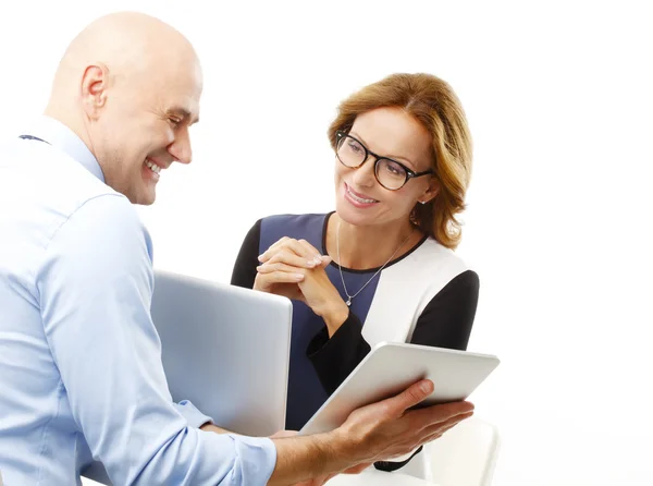 Businessman giving advise to sales woman — Stock Photo, Image