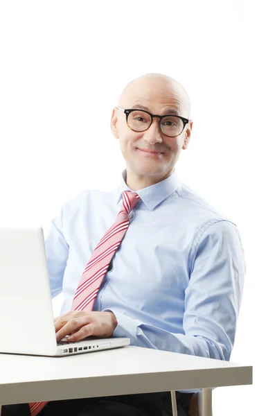 Businessman sitting in front of laptop — Stock Photo, Image