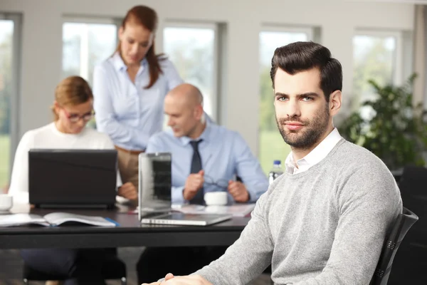 Broker sitting at office — Stock Photo, Image