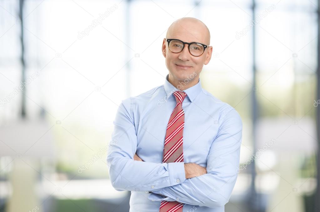 Businessman with arms crossed