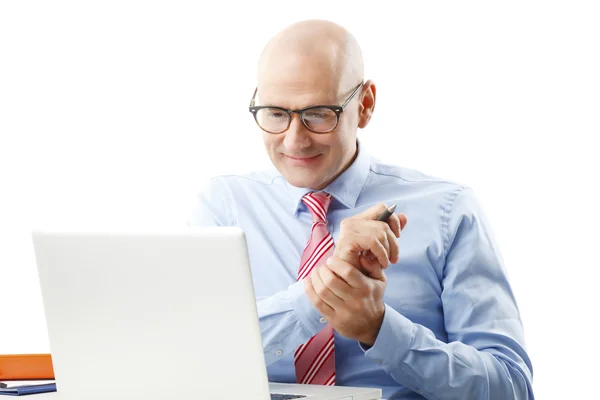 Businessman sitting in front of computer — Stock Photo, Image