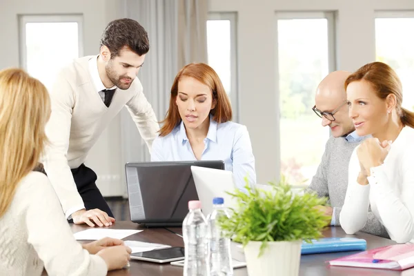 Business people sitting at meeting — Stock Photo, Image