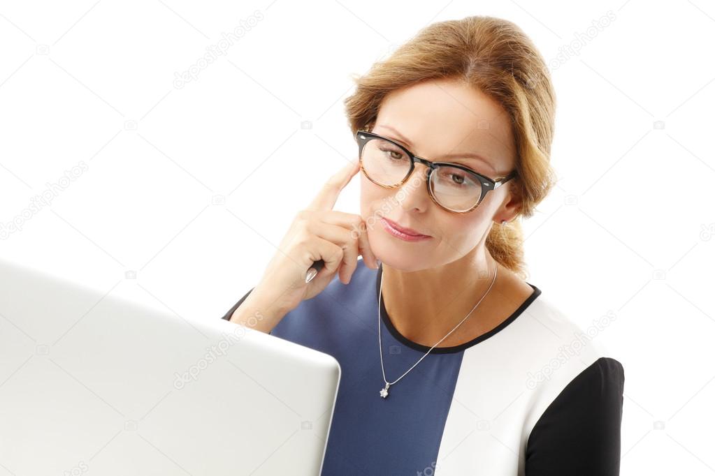 Businesswoman in front of laptop