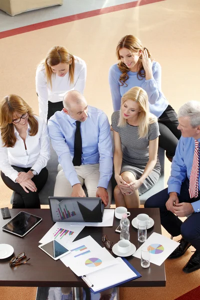 Business people sitting at meeting — Stock Photo, Image