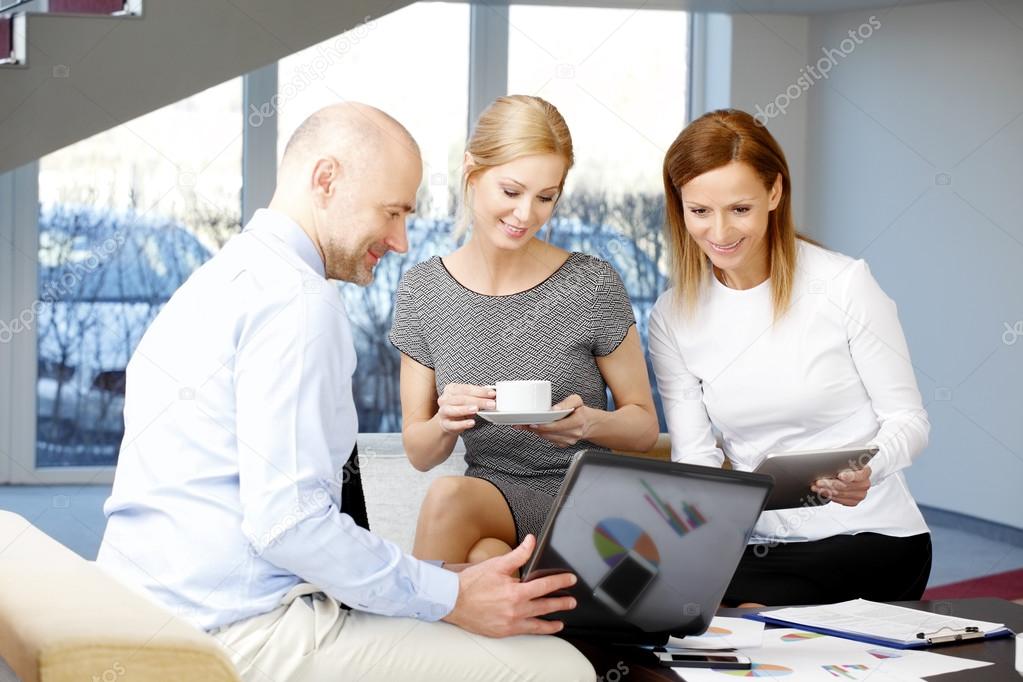 businessman presenting idea to sales team