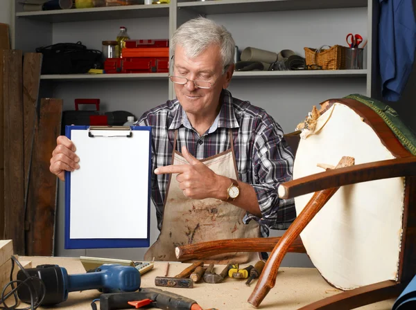 Senior man portrait at work — Zdjęcie stockowe