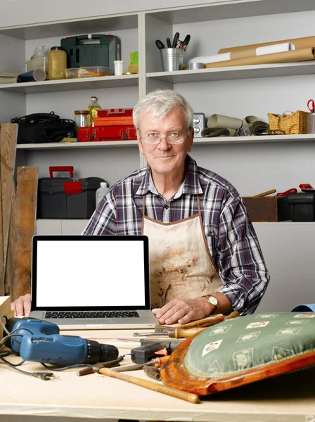 Carpenter sitting at his workshop — ストック写真