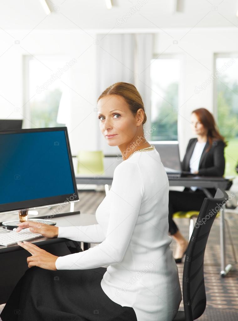 sales woman sitting at office