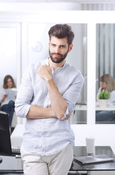 Businessman standing at office — Stock Photo, Image