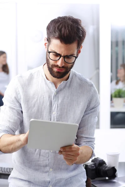 Sales man sitting at office desk — 스톡 사진