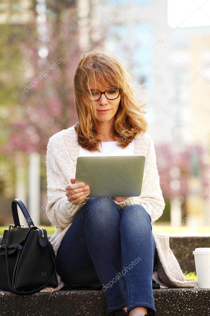 businesswoman using digital tablet
