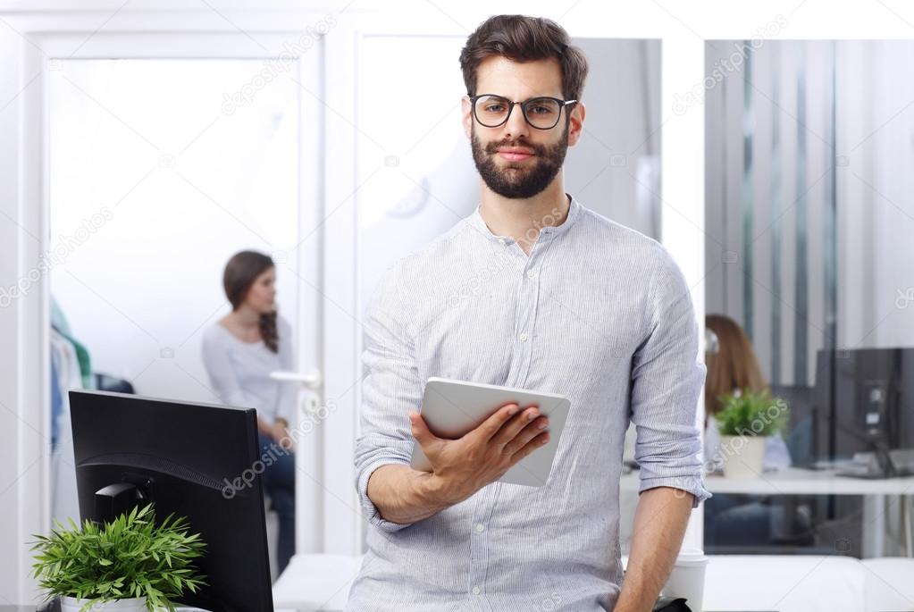 businessman holding digital tablet