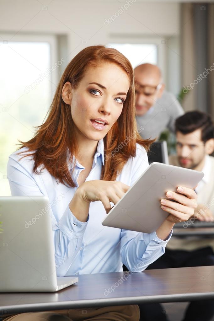 Businesswoman using digital tablet 