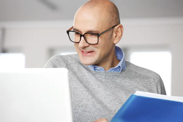 Financial director sitting at office — Stockfoto