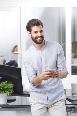 professional man holding hand mobile phone