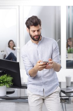 professional man holding hand mobile phone