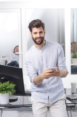 professional man holding hand mobile phone