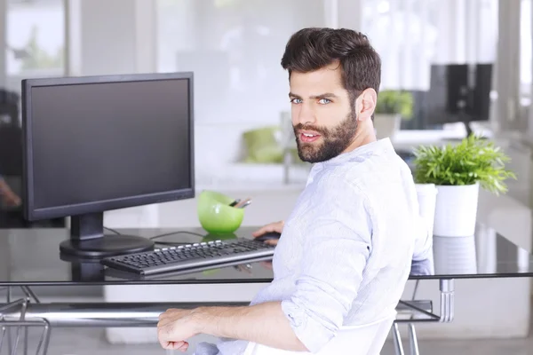 Professional sitting at design studio — Stock Photo, Image