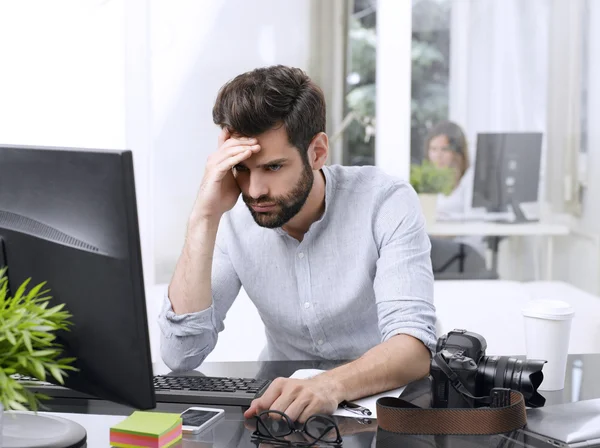 Worried young businessman — Stock Photo, Image