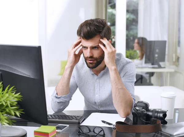 Worried businessman at office — Stock Photo, Image